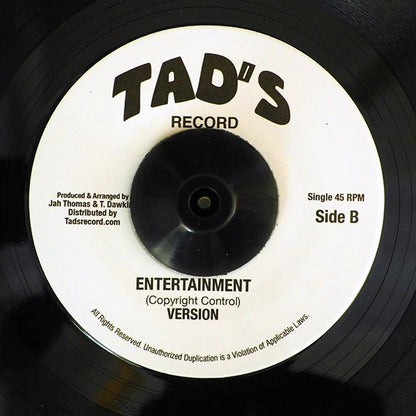 Triston Palmer - Entertainment  /  Roots Radics - Version (rhythm: "Heavenless AKA Entertainment") (7")