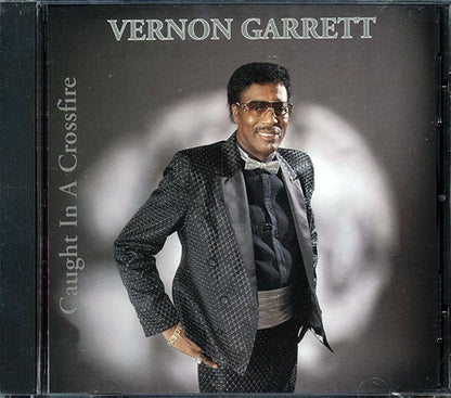 Vernon Garrett - Caught In A Crossfire (CD)