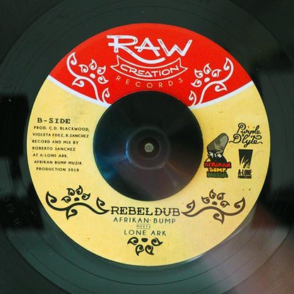 Purple D'Lyte - Rebel Up  /  Afrikan Bump, Lone Ark Riddim Force - Rebel Dub (7")