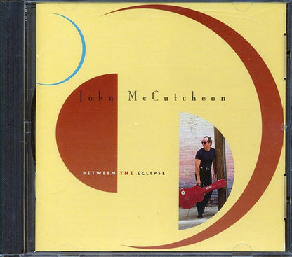 John McCutcheon - Between The Eclipse (CD)